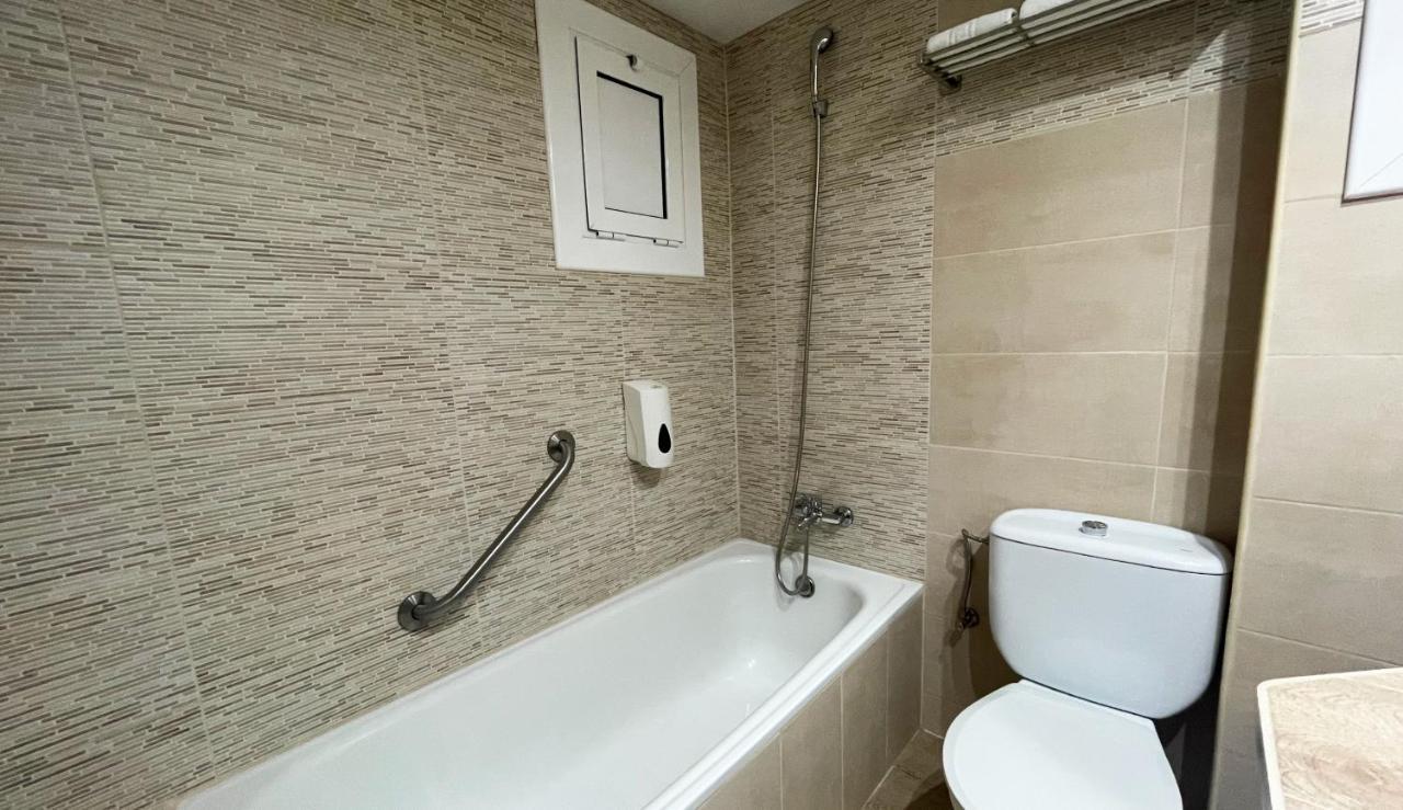 Chambre Lits Jumeaux avec Lit d'Appoint (3 adultes)