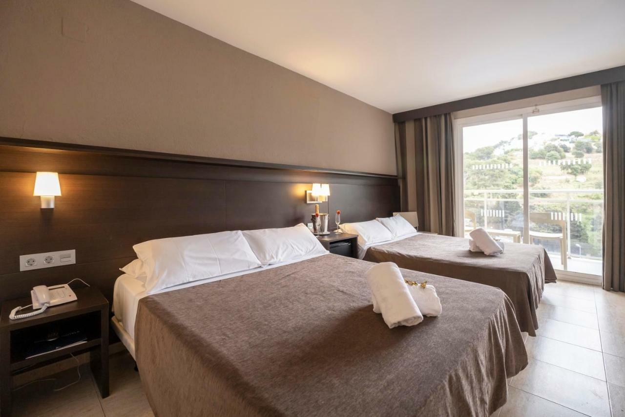 Chambre Double avec Lit d'Appoint (2 Adultes + 2 Enfants)